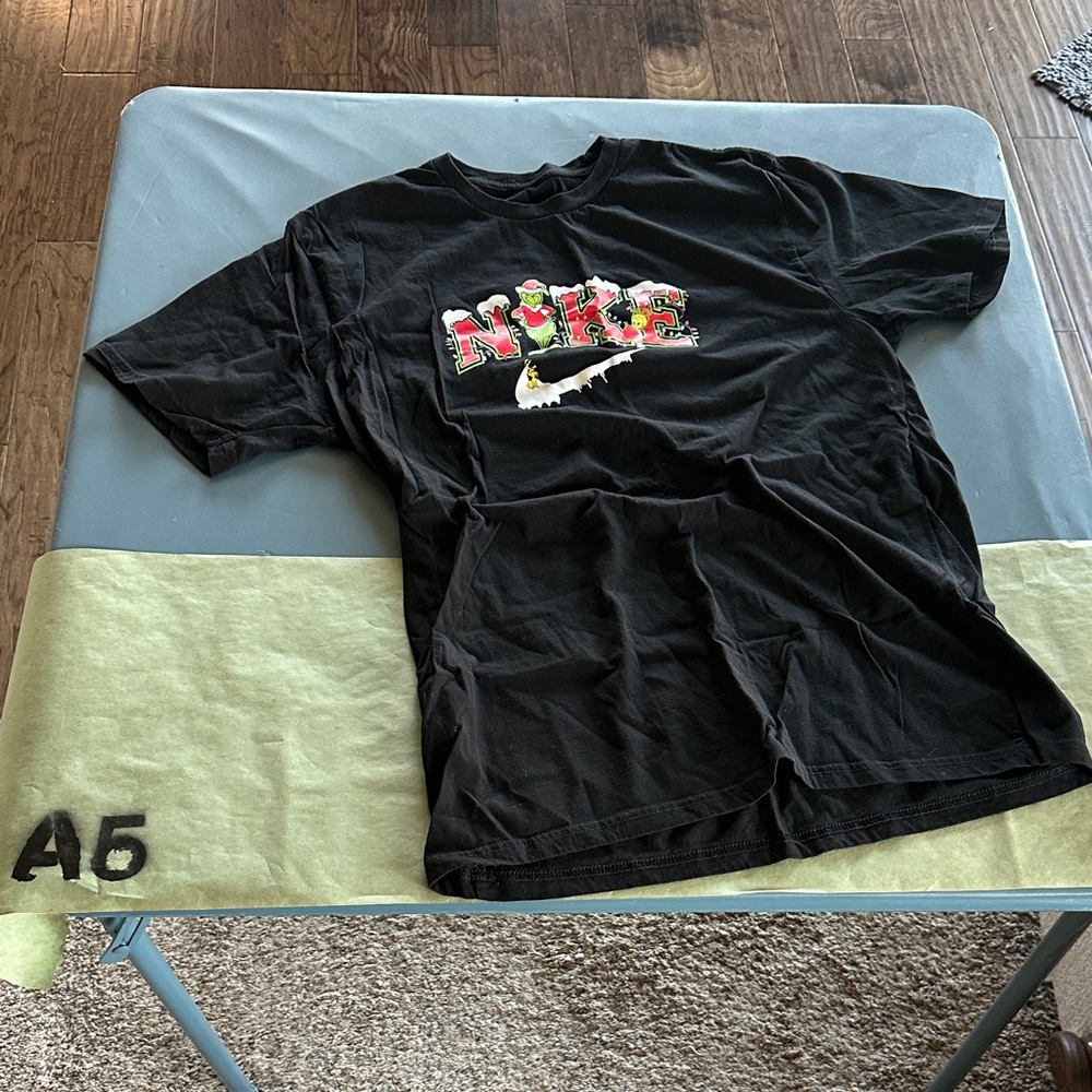Nike Black Tee with Festive Graphic